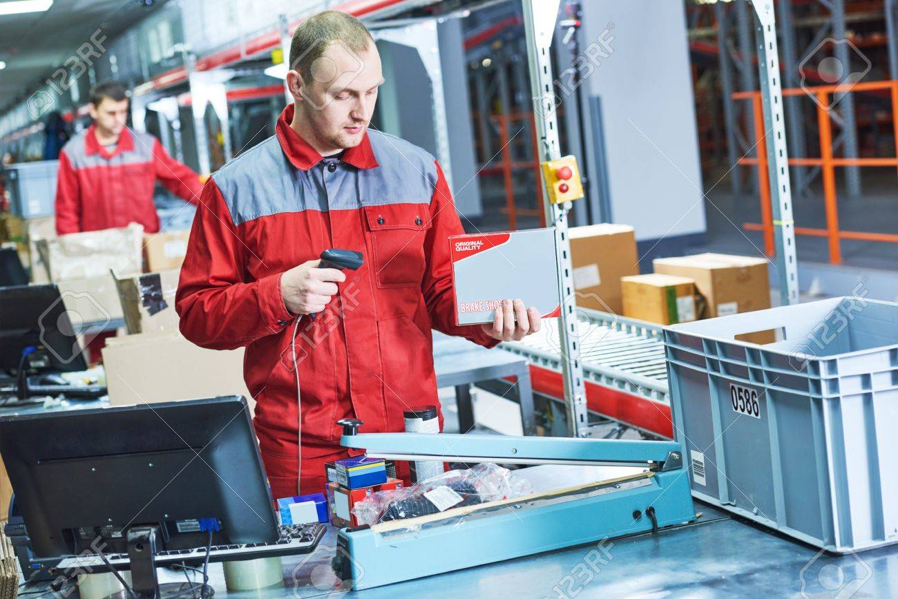 worker with laser barcode scanner at warehouse - 78508909 worker with laser barcode scanner at warehouse - 78508909