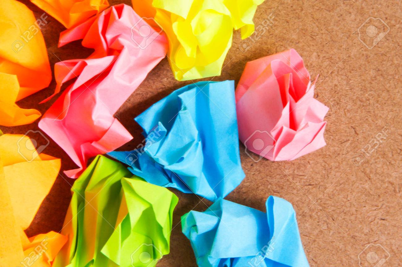Paper Ball Crumpled Of Sticky Note On Craft Paperboard