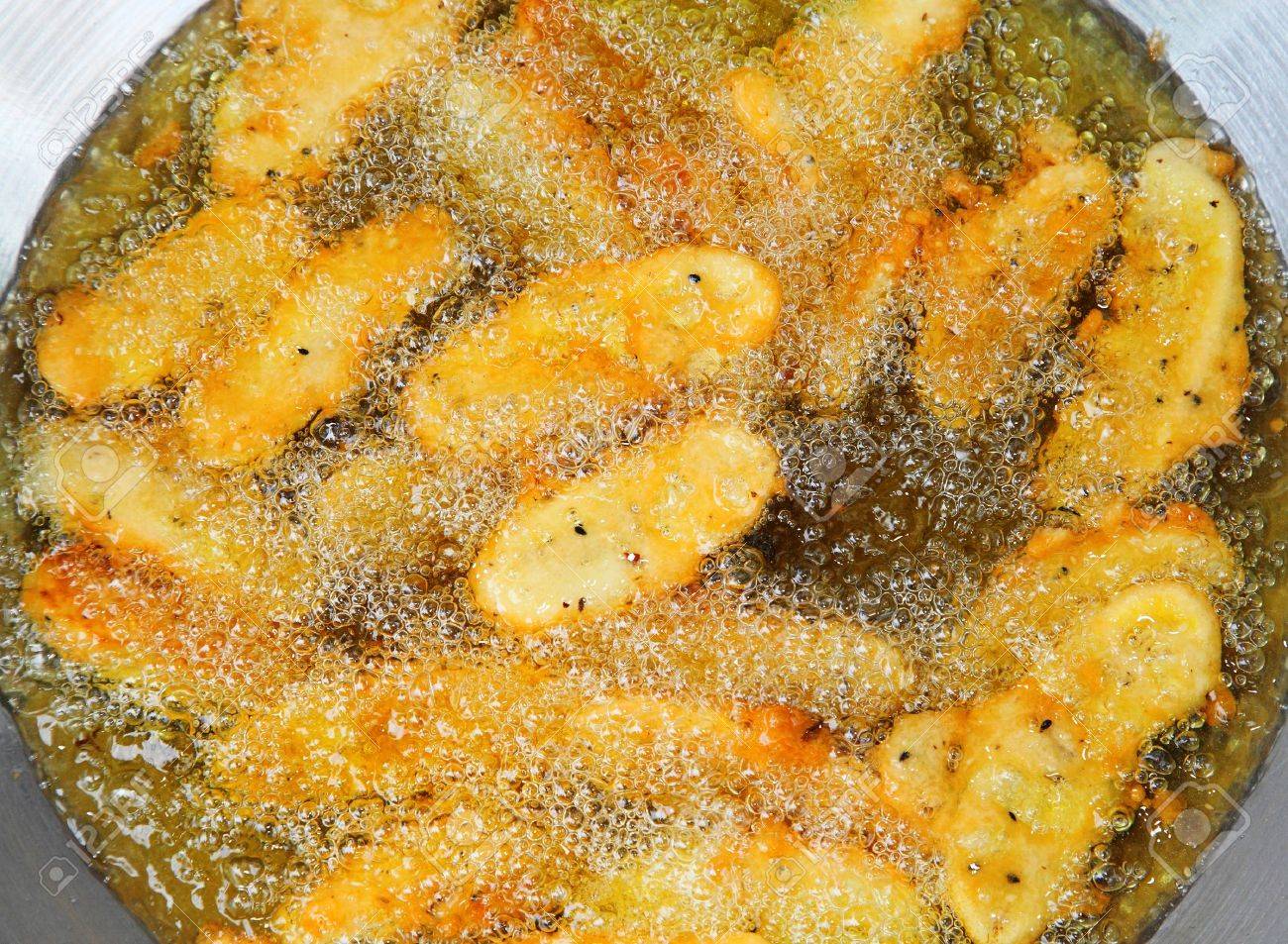 Frying Banana in the pan called Kruay Tod , the favorite dessert in Thailand - 14019113 Frying Banana in the pan called Kruay Tod , the favorite dessert in Thailand - 14019113