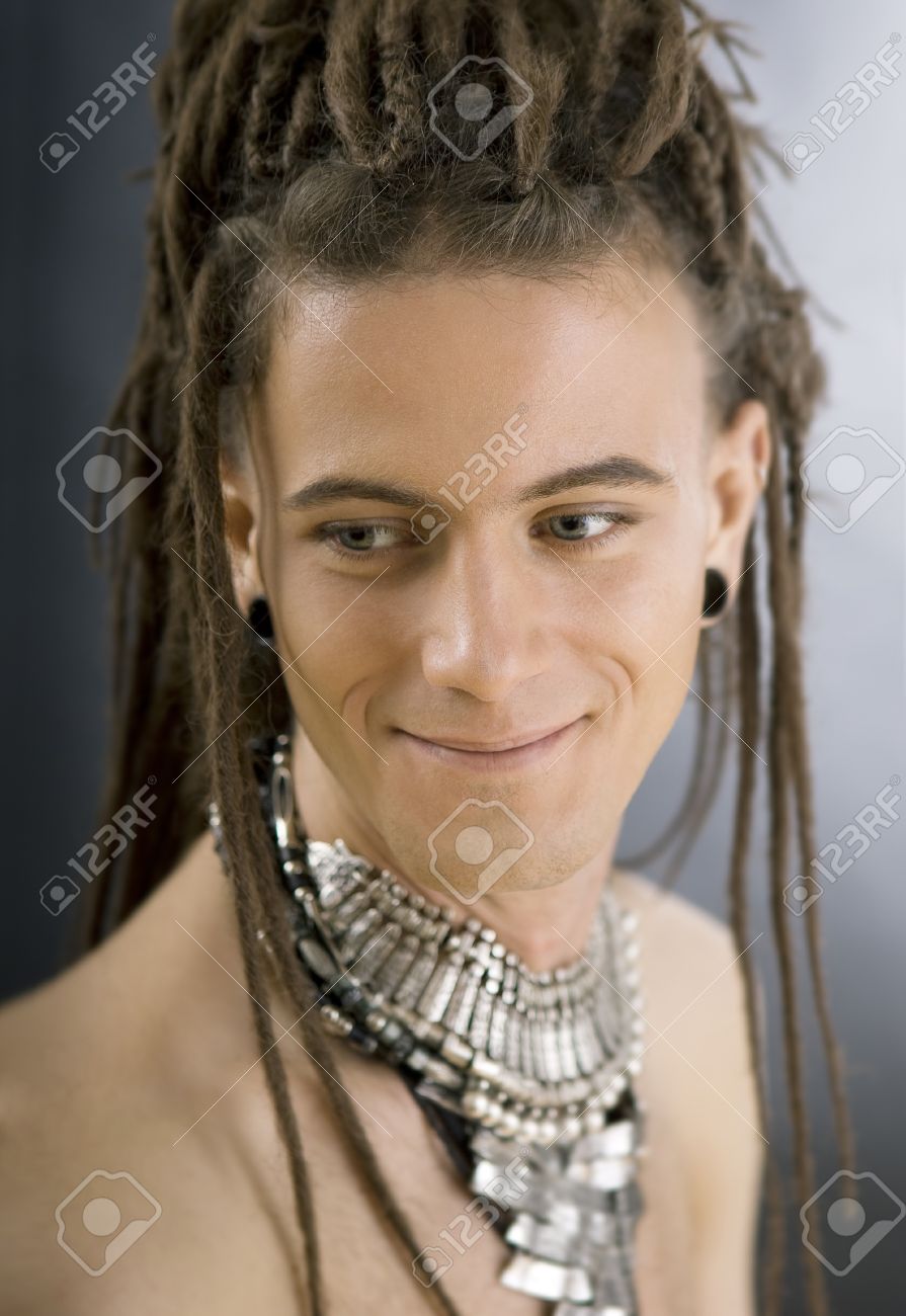 Stylish Handsome Guy With Dreadlocks And Jewelry