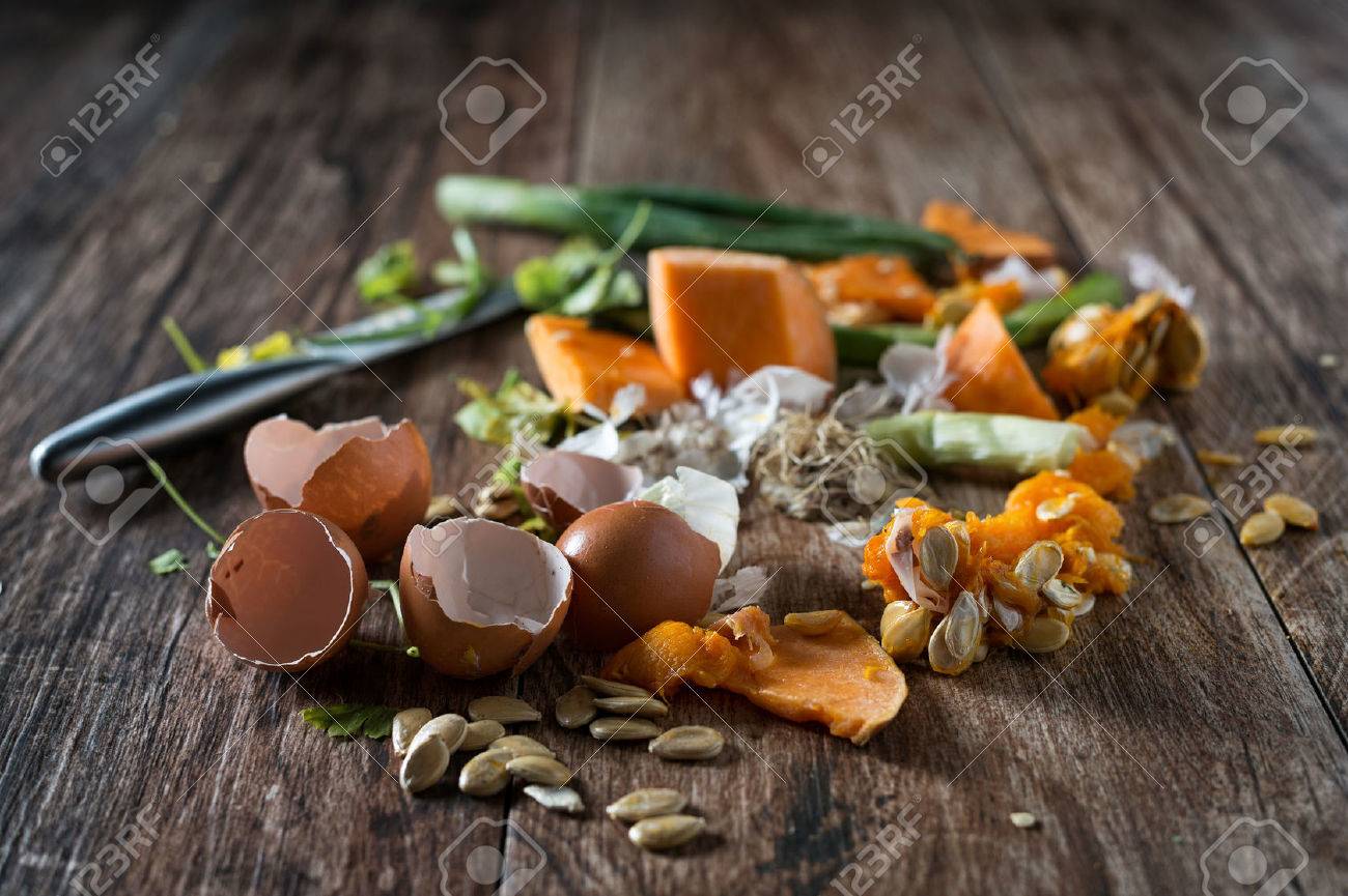 Organic leftovers, waste from vegetable ready for recycling and to compost. Collecting food leftovers for composting. Environmentally responsible behavior, ecology concept. - 61985056 Organic leftovers, waste from vegetable ready for recycling and to compost. Collecting food leftovers for composting. Environmentally responsible behavior, ecology concept. - 61985056