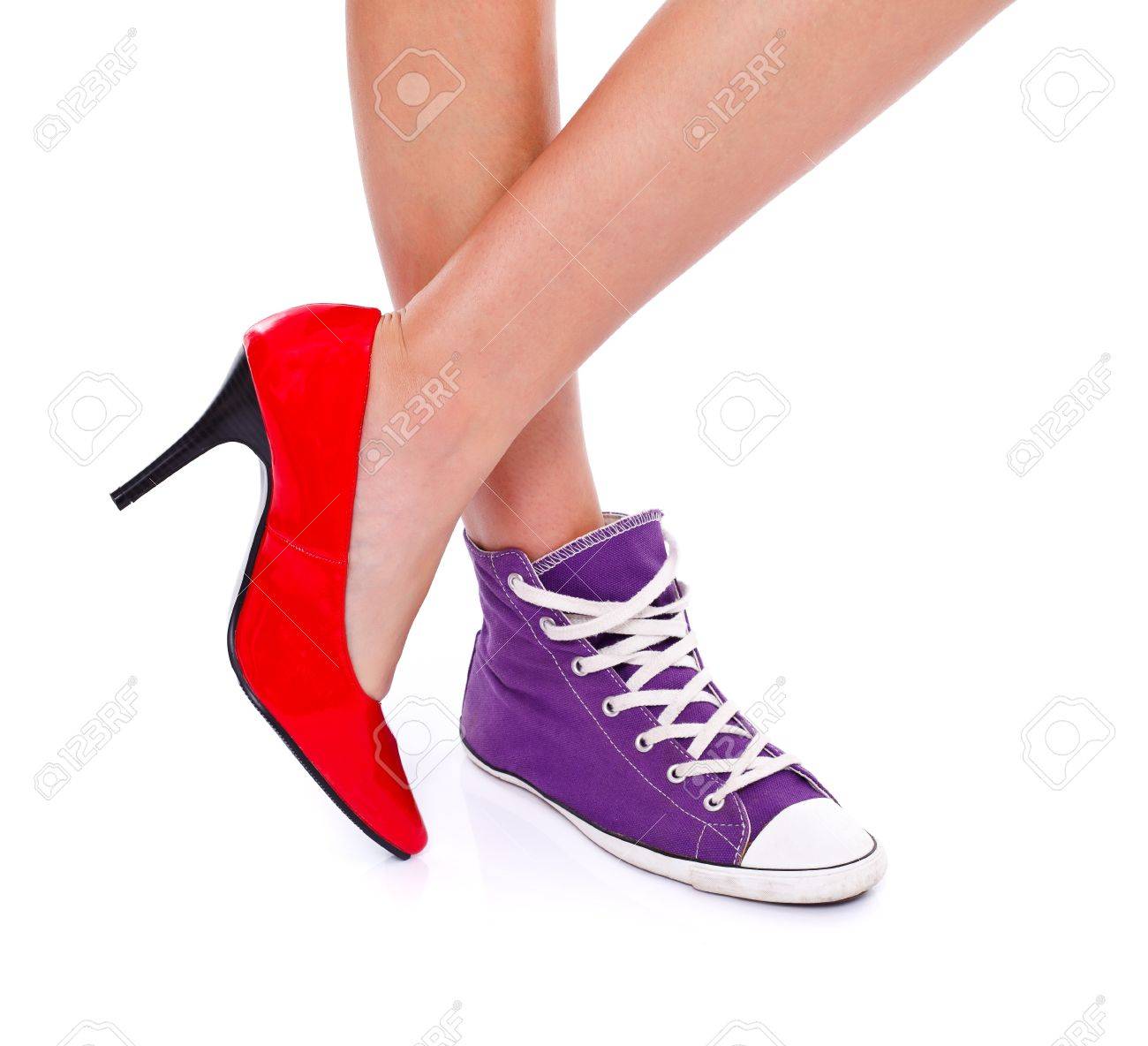 Woman Wearing Red High Heel Shoe On One Leg And Sport Shoe On Stock Photo Picture And Royalty Free Image Image 16654056