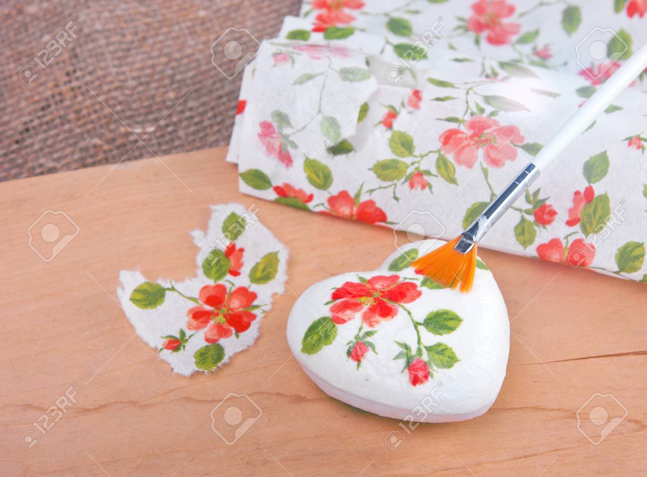 Making gift heart in decoupage technique