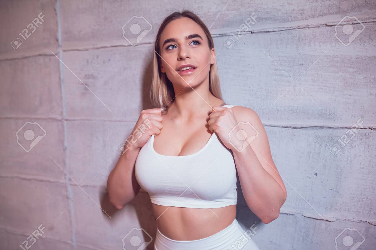 Sexy Blonde Woman With Huge Breast In A White Top And Leggings. Mock-up.  Stock Photo, Picture And Royalty Free Image. Image 80544204.