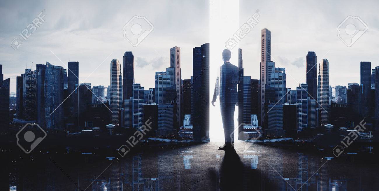 Concept of businessman. Double exposure photo of panoramic city view at sunrise - 52906043 Concept of businessman. Double exposure photo of panoramic city view at sunrise - 52906043