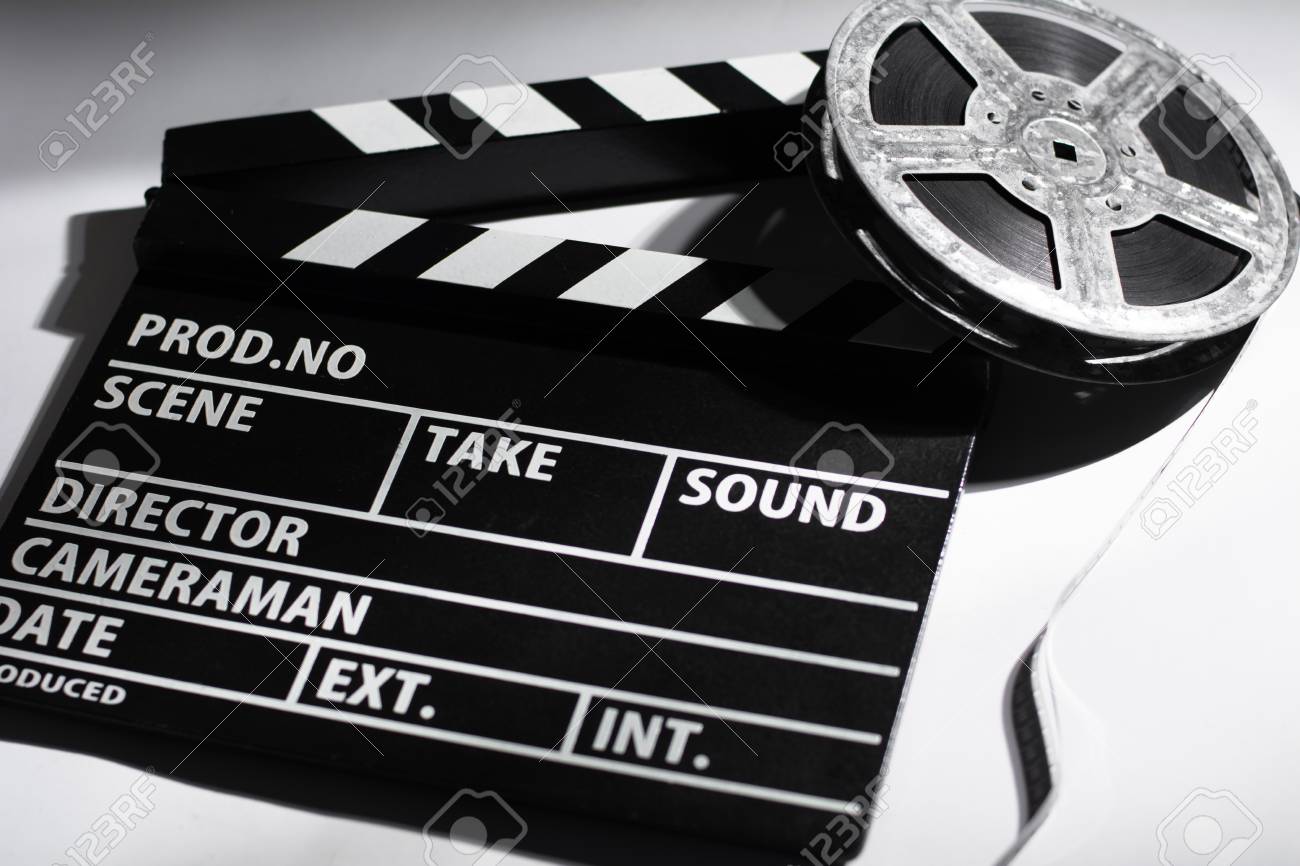 Clap Cinema On The Table Metal Reel Of Film Stock Photo Picture And Royalty Free Image Image Clap Cinema On The Table Metal Reel Of Film Stock Photo Picture And Royalty Free Image Image