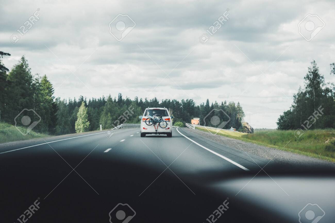 Car driving on winding road for new adventures pov - 146679682 Car driving on winding road for new adventures pov - 146679682