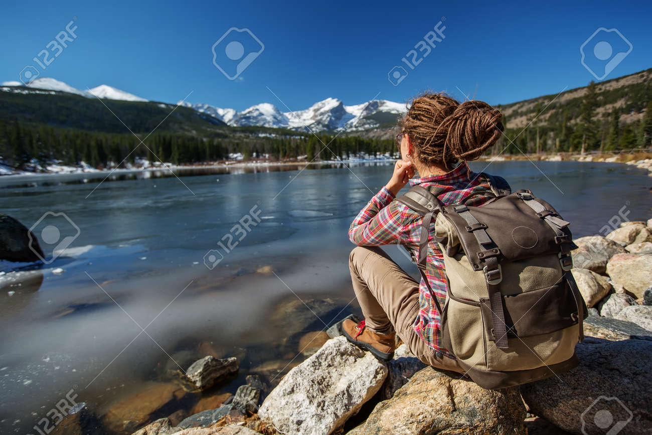 Hiker in Rocky mountains National park in USA - 120574860 Hiker in Rocky mountains National park in USA - 120574860