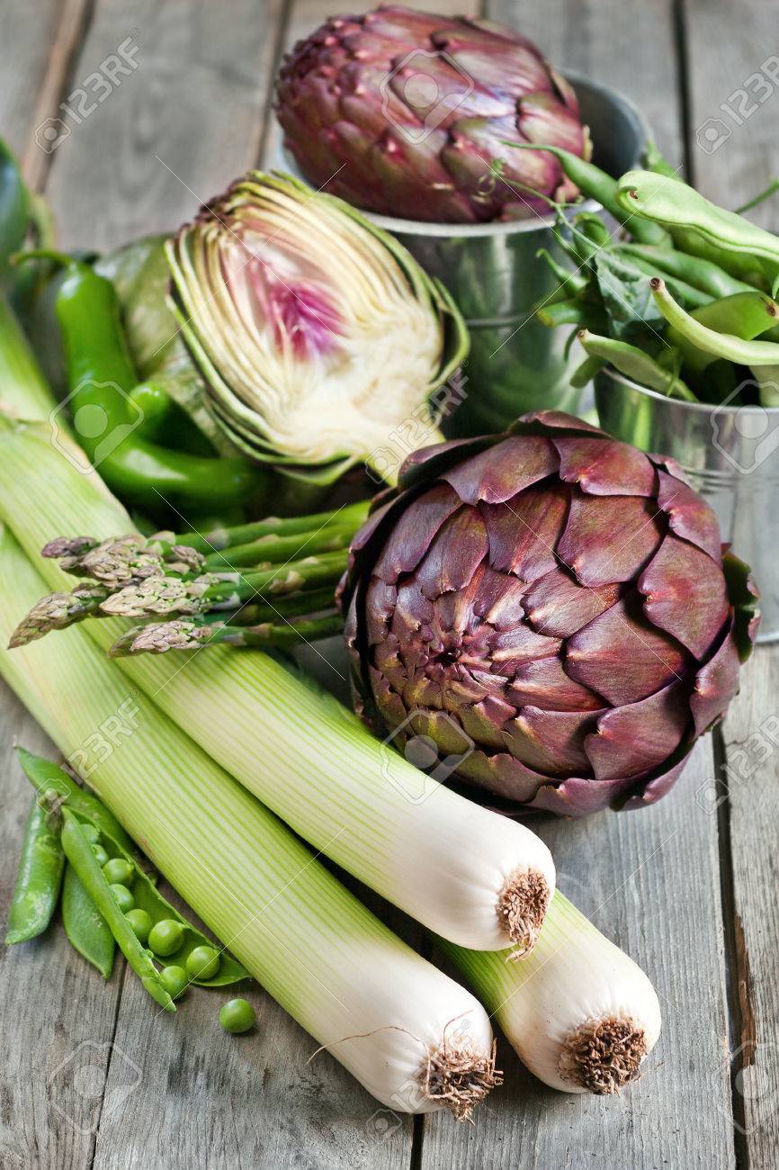 Artichoke, leek, beans, pea, asparagus and green hot pepper on old wood table - 27364309 Artichoke, leek, beans, pea, asparagus and green hot pepper on old wood table - 27364309
