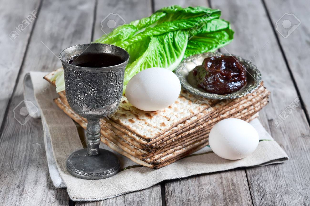 Wine, egg, bitter salad leaves, matzot and haroset - traditional jewish passover celebration elements. - 38625968 Wine, egg, bitter salad leaves, matzot and haroset - traditional jewish passover celebration elements. - 38625968