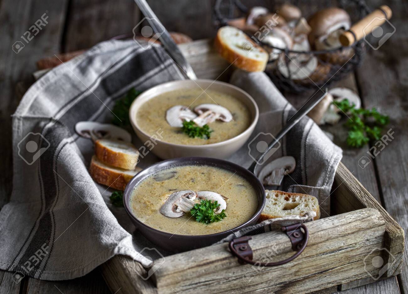 Delicious homemade mushrooum soup puree with portobello and wild mushrooms on rustic table - 138759171 Delicious homemade mushrooum soup puree with portobello and wild mushrooms on rustic table - 138759171