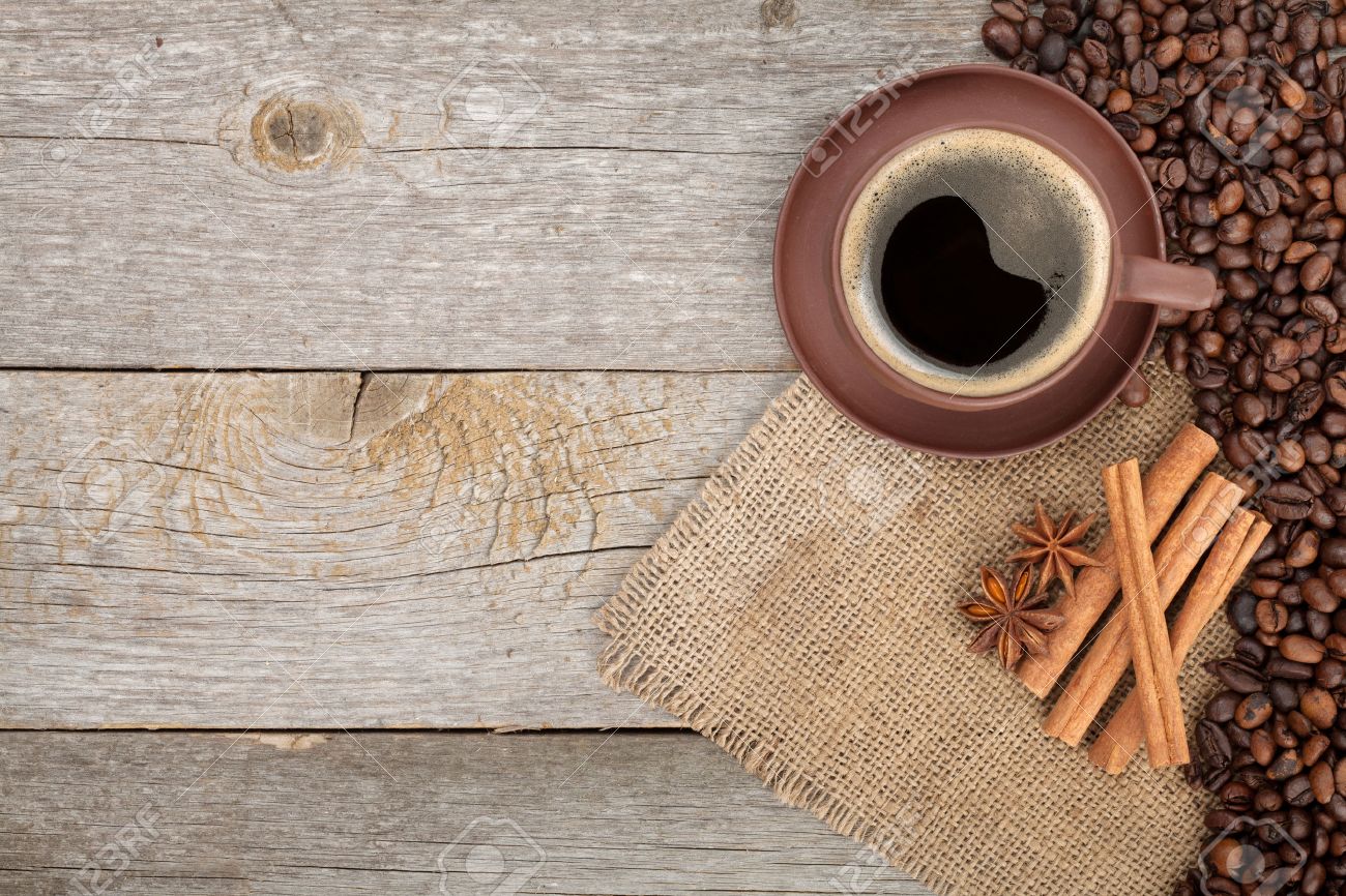 Coffee Cup And Spices On Wooden Table Texture With Copy Space Stock Photo Picture And Royalty Free Image Image 27398873