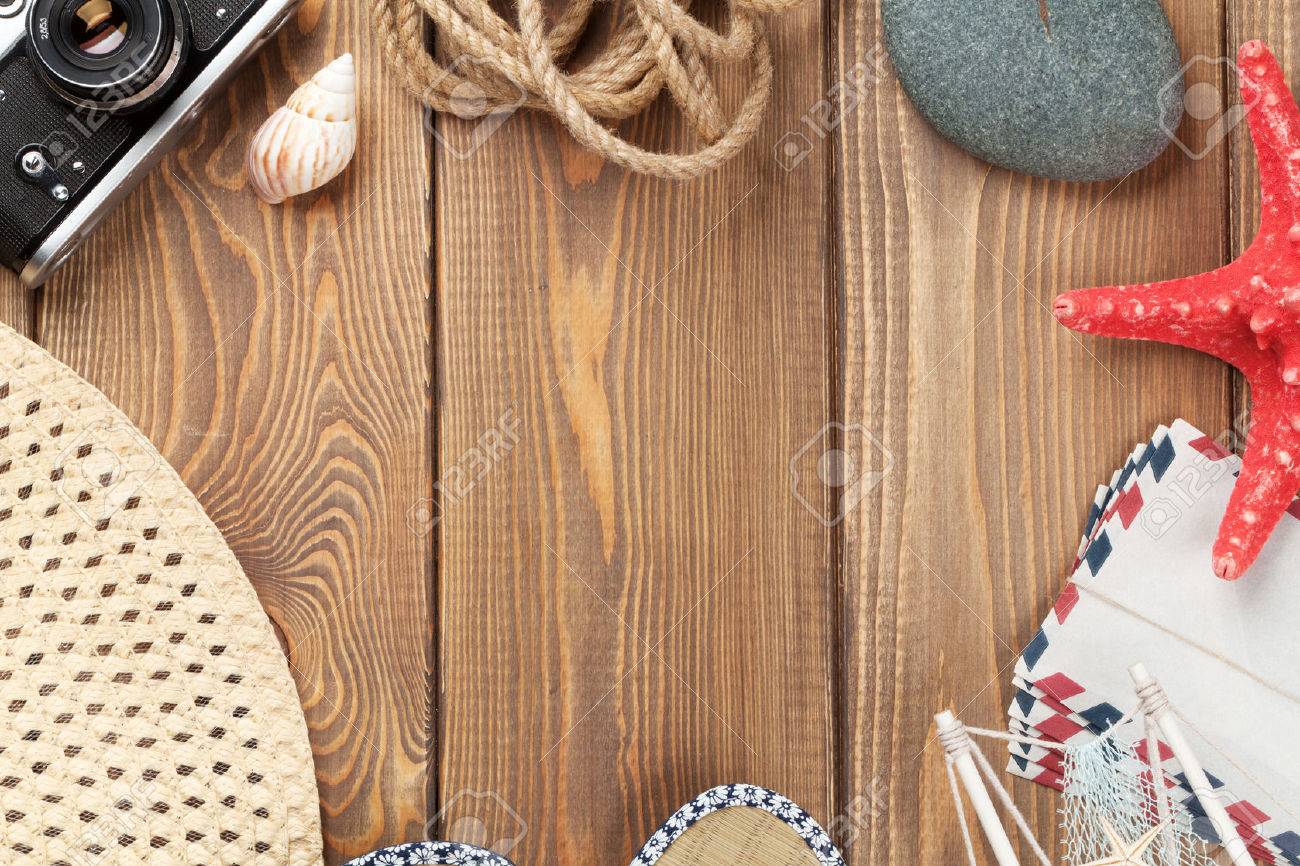 Travel and vacation background with items over wooden table. Top view with copy space - 42663776 Travel and vacation background with items over wooden table. Top view with copy space - 42663776