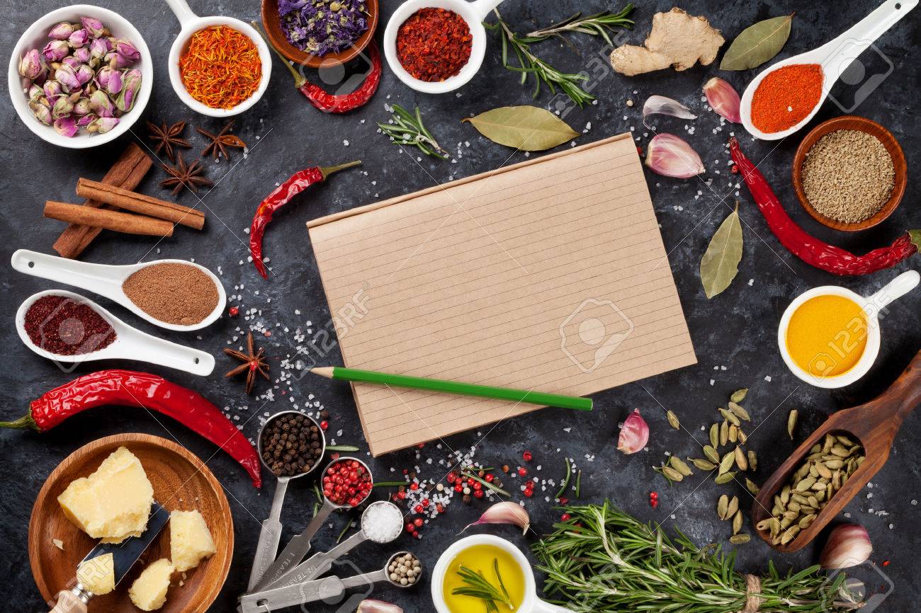 Notepad for your recipe with herbs and spices over black stone background. Top view with copy space - 51528631 Notepad for your recipe with herbs and spices over black stone background. Top view with copy space - 51528631