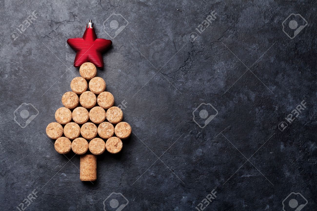 Wine corks shaped christmas tree on stone table. Top view with copy space for your text - 64456912 Wine corks shaped christmas tree on stone table. Top view with copy space for your text - 64456912