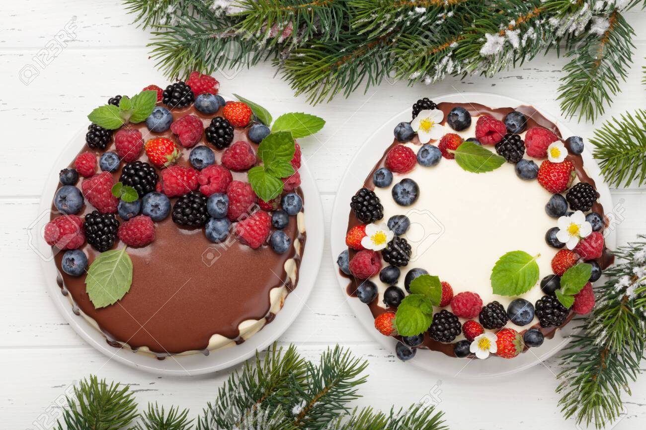 Christmas Holiday Chocolate Cake And Cheesecake With Berries Stock Photo Picture And Royalty Free Image Image 130531307