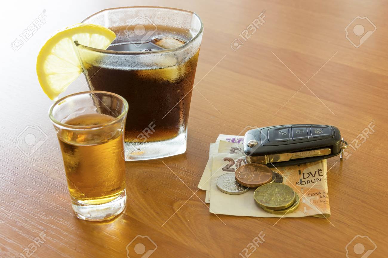 Car Keys Laid On The Bar Beside Cocktail And Whiskey Whiskey - 