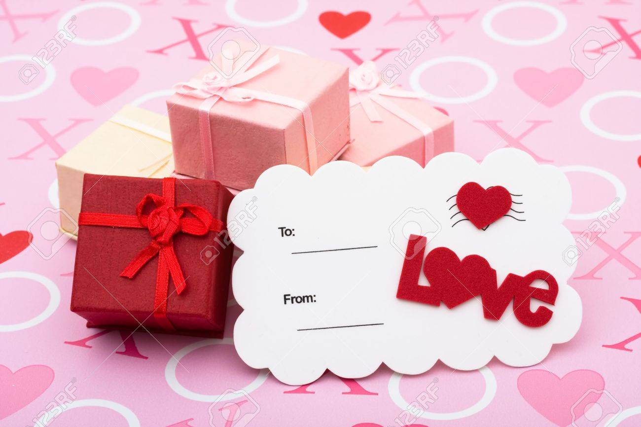 A Stack Of Pretty Presents With Love Postcard On A Pink Love - 