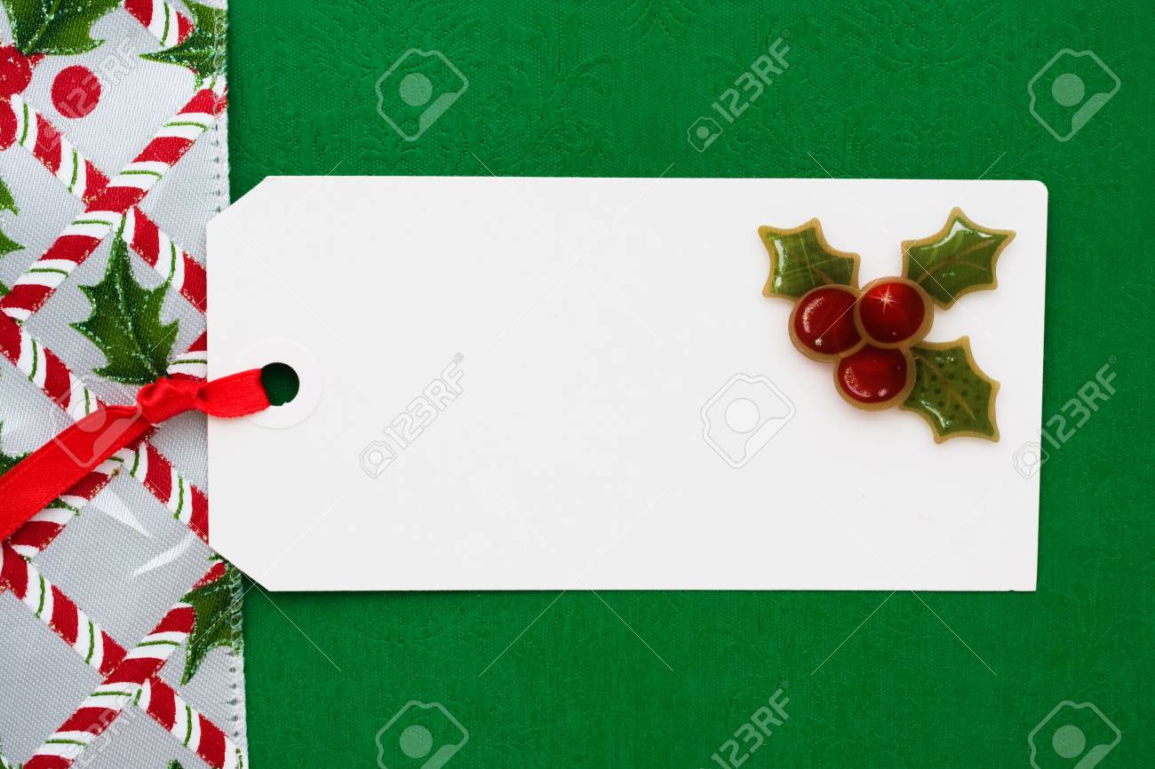 A Blank Gift Tag With Ribbon Border Green Background Stock Photo, Picture  and Royalty Free Image. Image 5964071., image size:1300x866