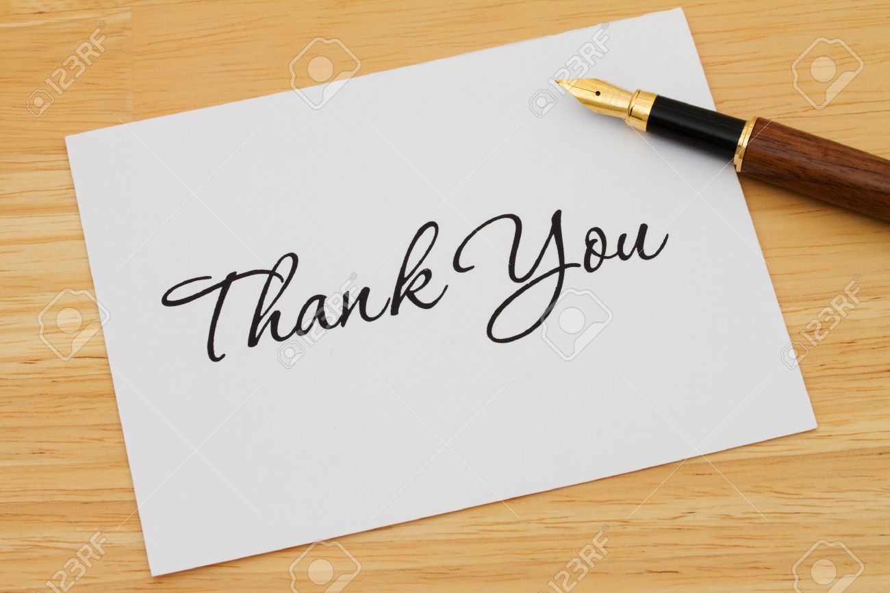A thank you card with a fountain pen on a wooden desk, Writing a Thank You Note - 19447835 A thank you card with a fountain pen on a wooden desk, Writing a Thank You Note - 19447835