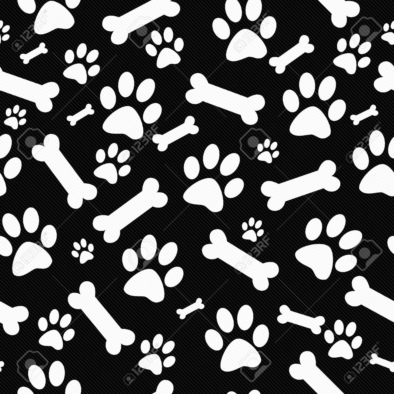 Banque dimages black and white dog paw prints and bones tile motif répétez fond qui est transparente et répétitions