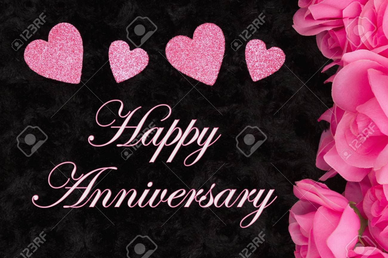 Happy Anniversary Greeting With Pink Roses With Hearts On Black