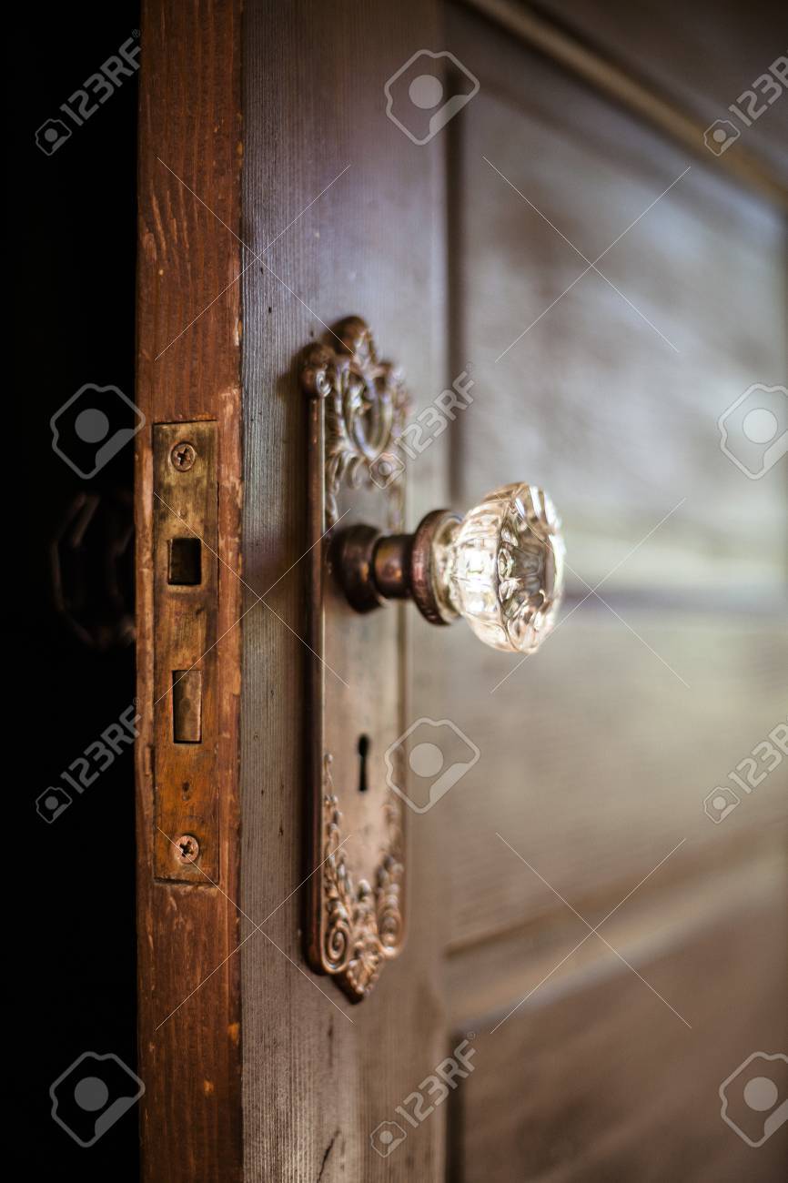 An Old Door Open With An Ornate Door Knob Stock Photo Picture And Royalty Free Image Image