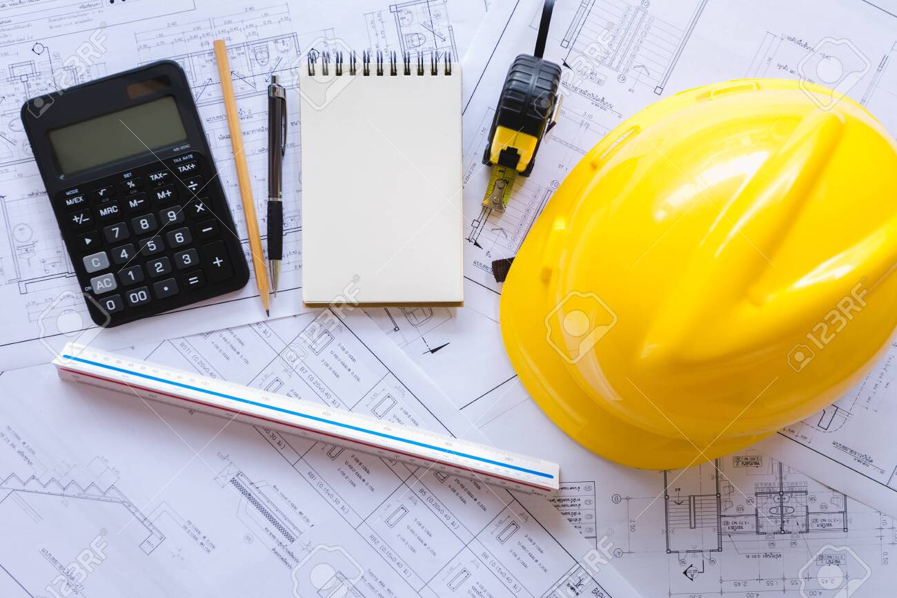 Top view architect tools on paper white plan building construction,Concept work architect - 122270049 Top view architect tools on paper white plan building construction,Concept work architect - 122270049