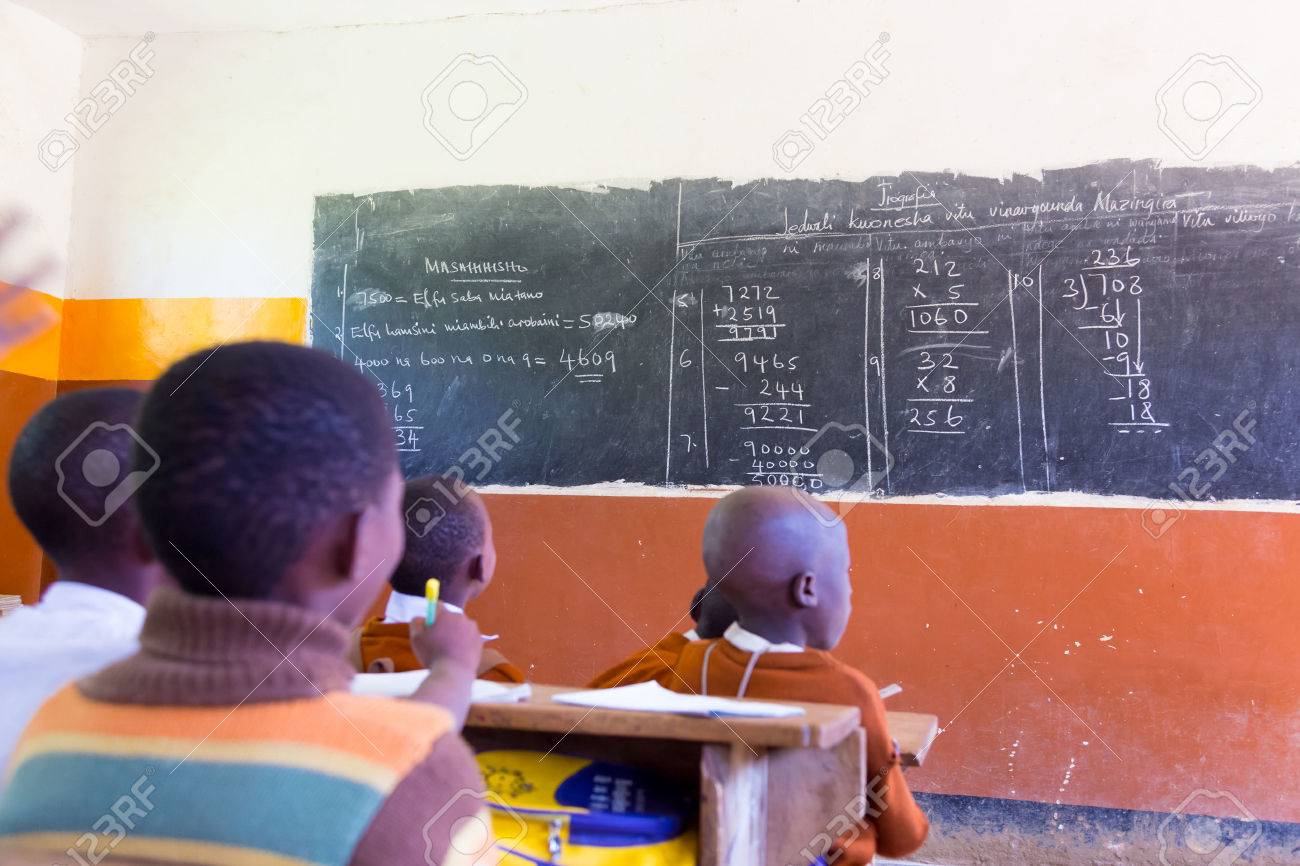 Rural african school with school children at their desks in classroom in North Tanzania, Africa. - 39690528 Rural african school with school children at their desks in classroom in North Tanzania, Africa. - 39690528
