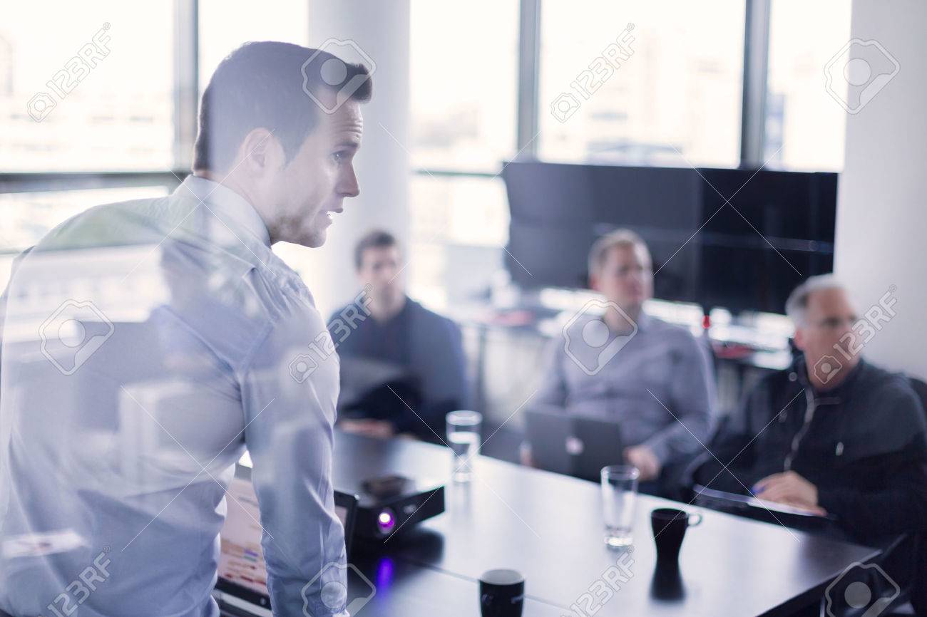 Business Man Making A Presentation At Office. Business Executive - 1300x866 - jpeg Office Business