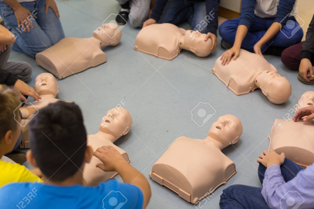 First Aid Cardiopulmonary Resuscitation Course In Primary School Kids Practicing On Resuscitation Dolls Stock Photo Picture And Royalty Free Image Image 65018129