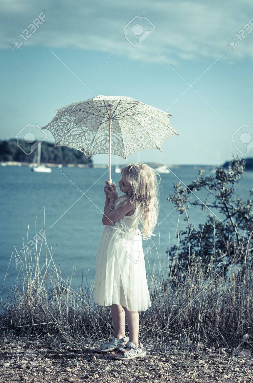 little white dress by the shore