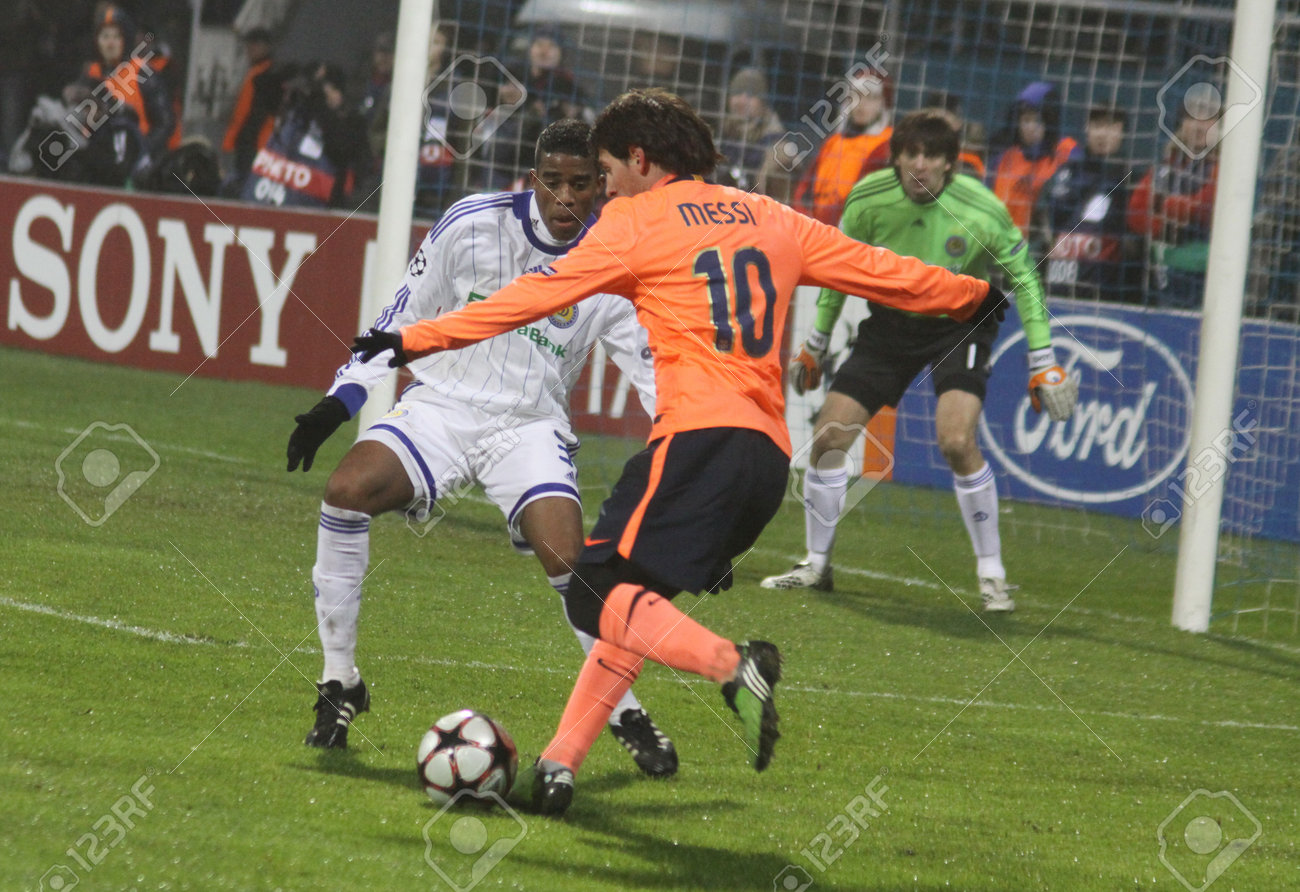 KIEV, UKRAINE - DECEMBER 9, 2009: Lionel Messi (orange T-shirt).. Stock  Photo, Picture And Royalty Free Image. Image 7738345.