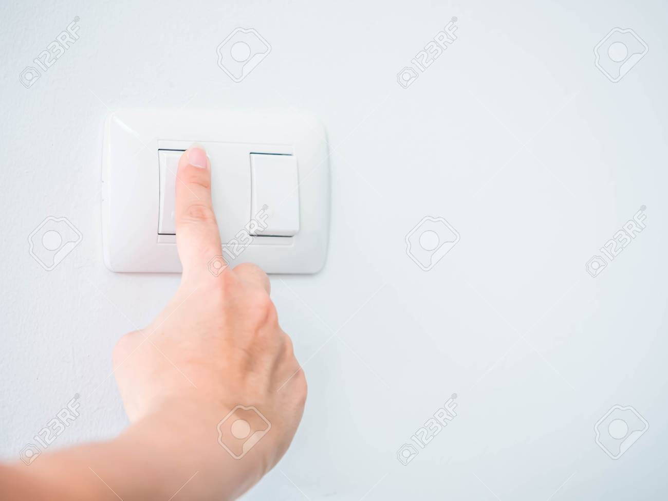 Woman Is Pressing The Switch Button For Turning Off The Light. Stock Photo,  Picture and Royalty Free Image. Image 96124454., image size:1300x975