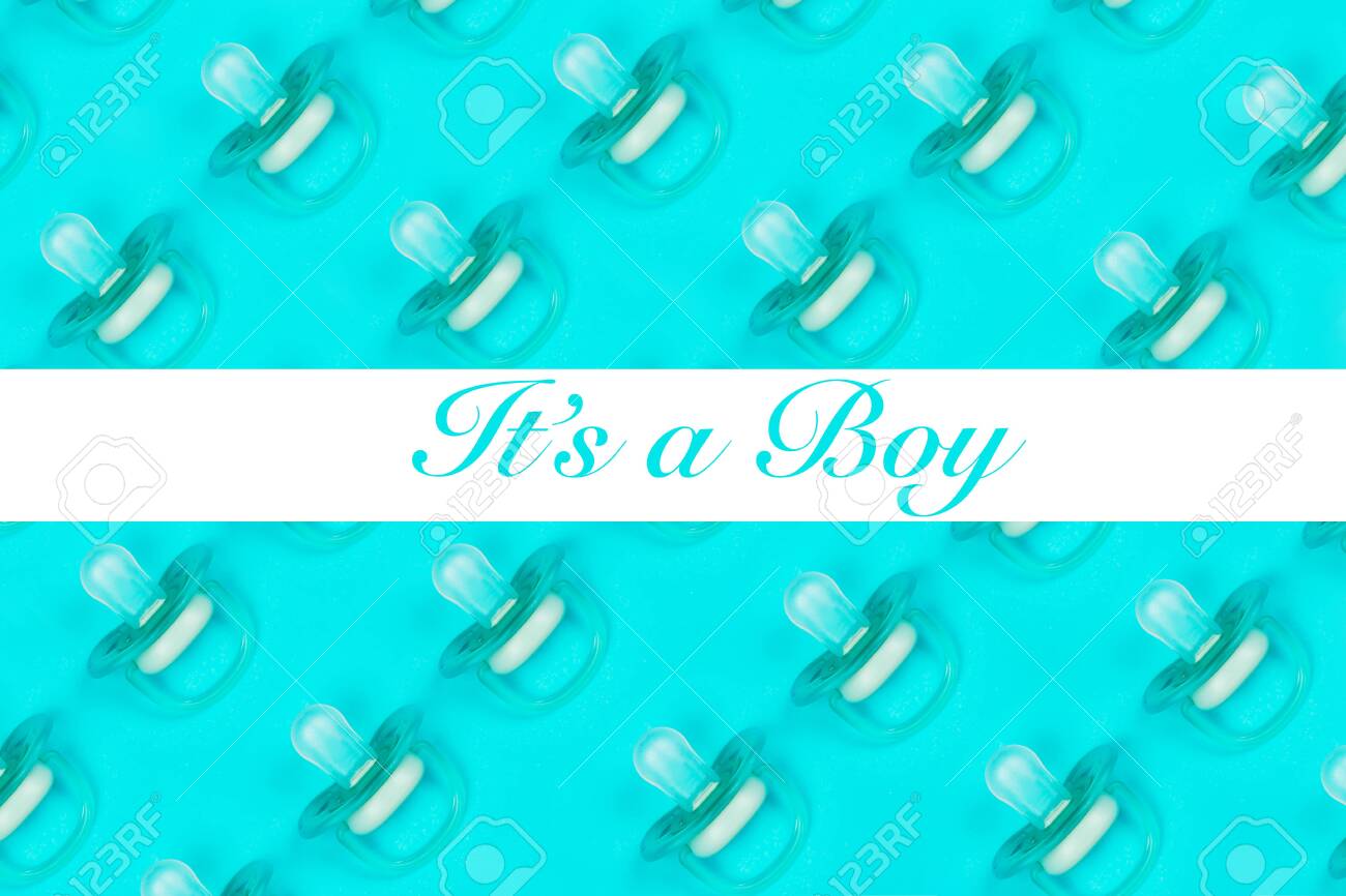 Pattern blue baby pacifiers, dummy with rubber on blue background with text Its a boy. Flat lay. Top view. - 143562540 Pattern blue baby pacifiers, dummy with rubber on blue background with text Its a boy. Flat lay. Top view. - 143562540