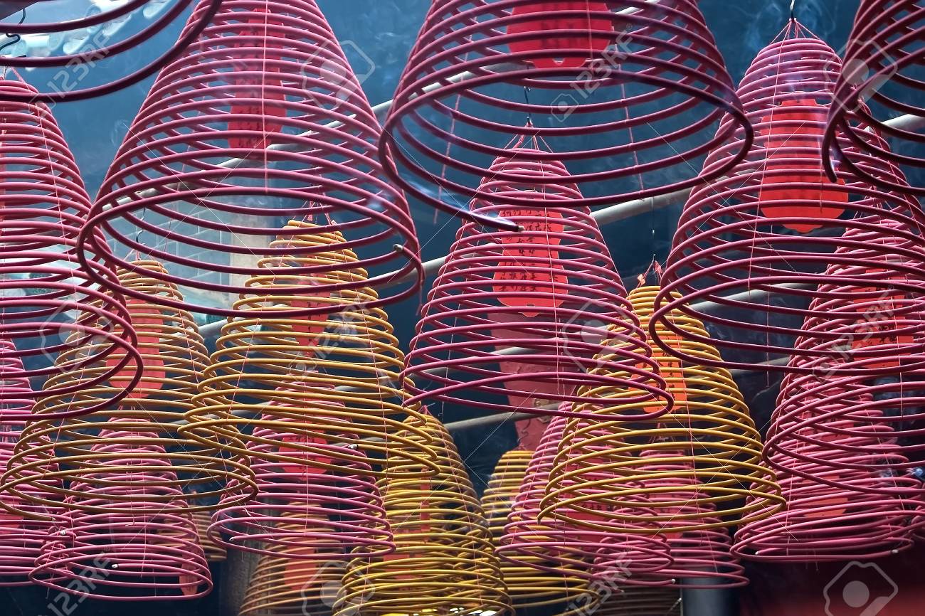 Cones Incense Burners Hooked From A Ceiling Of A Chinese