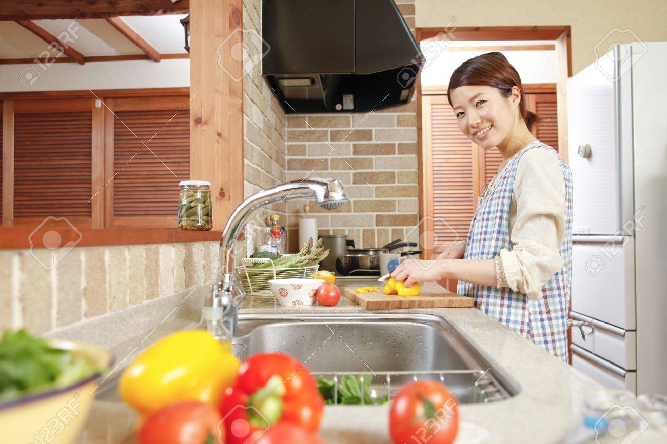 Housewife In The Kitchen Stock Photo