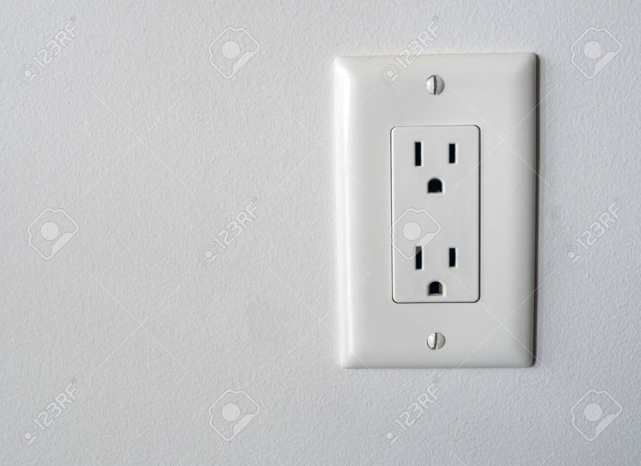 129074139-isolated-north-american-power-outlet-plug-in-socket-on-a-white-wall-background-type-b-style.jpg