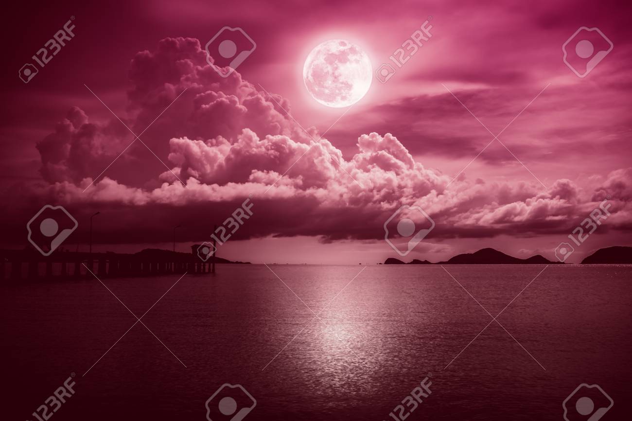Beautiful Landscape View Of The Sea. Colorful Red Sky With Clouds And  Bright Full Moon On