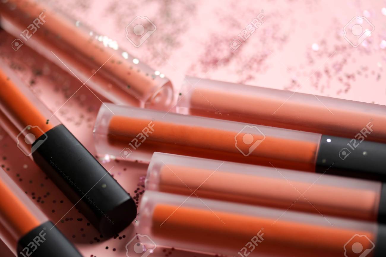 fashion colorful lipsticks over black background professional