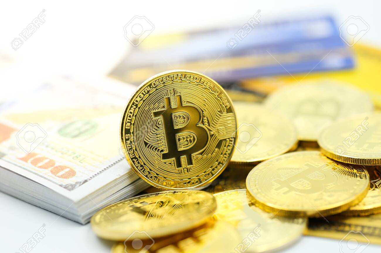 Bitcoins With Credit Card Of Dollar Banknote,accepting Bitcoin For Payment,  Electronic Money Exchange Concept. Stock Photo, Picture and Royalty Free  Image. Image 129881266.