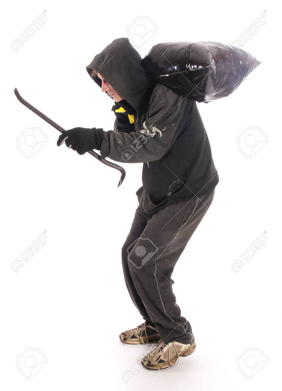 suspicious burgler with crowbar stock photo picture and royalty
