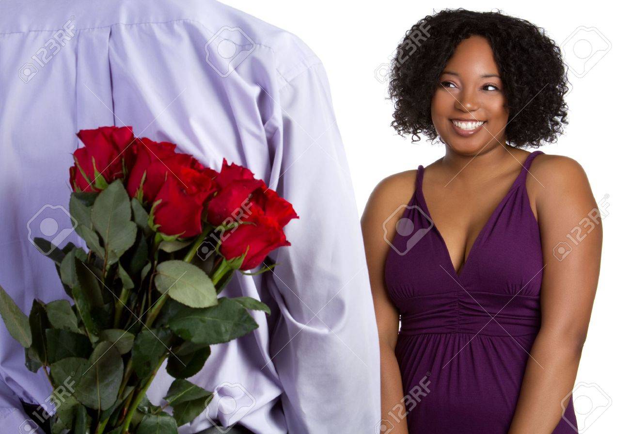 guy giving girl flowers