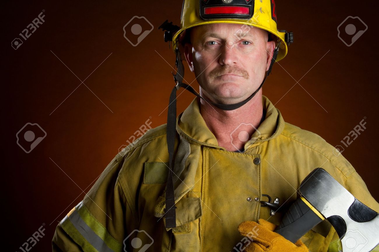 Firefighter fireman man holding axe - 10435418 Firefighter fireman man holding axe - 10435418