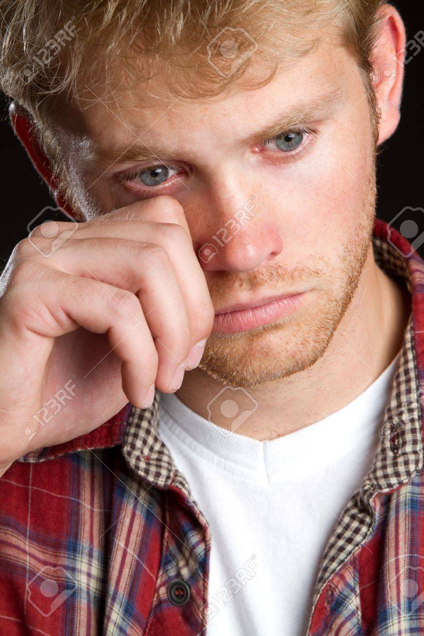 Emotional handsome young man crying - 10605405 Emotional handsome young man crying - 10605405