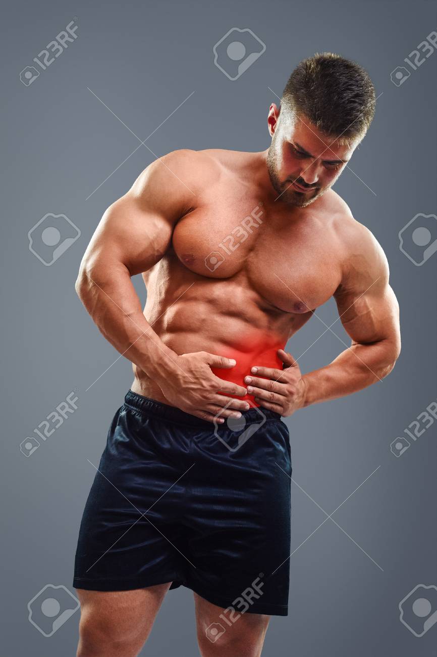 Bodybuilder Avec Douleur Dans Le Cote Gauche Du Ventre Homme Fort Ayant Des Douleurs Au Pancreas Et Main Dans La Main Sur L Abdomen Zone En Surbrillance Rouge Banque D Images Et Photos Libres Bodybuilder Avec Douleur Dans Le Cote Gauche Du Ventre Homme Fort Ayant Des Douleurs Au Pancreas Et Main Dans La Main Sur L Abdomen Zone En Surbrillance Rouge Banque D Images Et Photos Libres