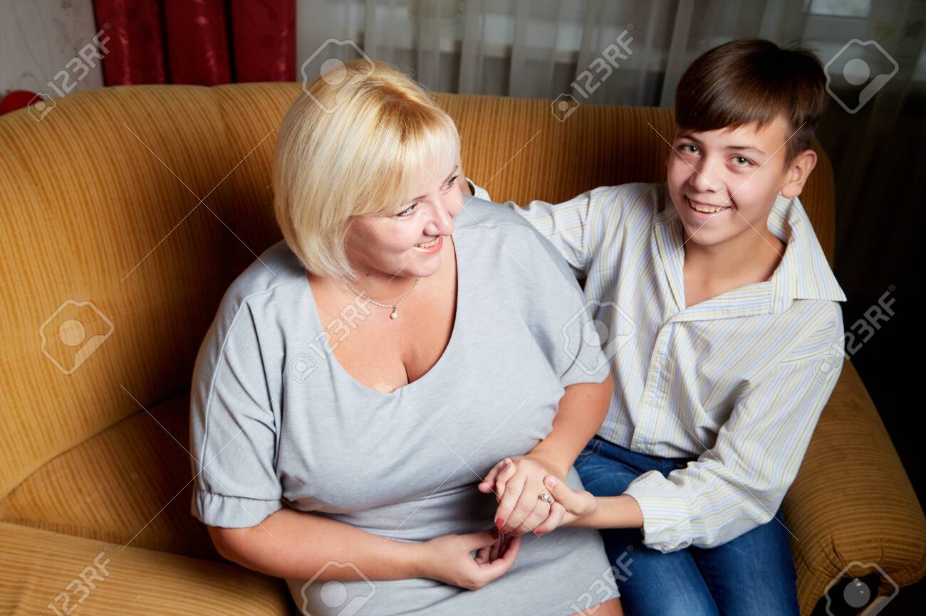 Adalt Mother And Her Young Son At Home Stock Photo, Picture and Royalty  Free Image. Image 120434426.