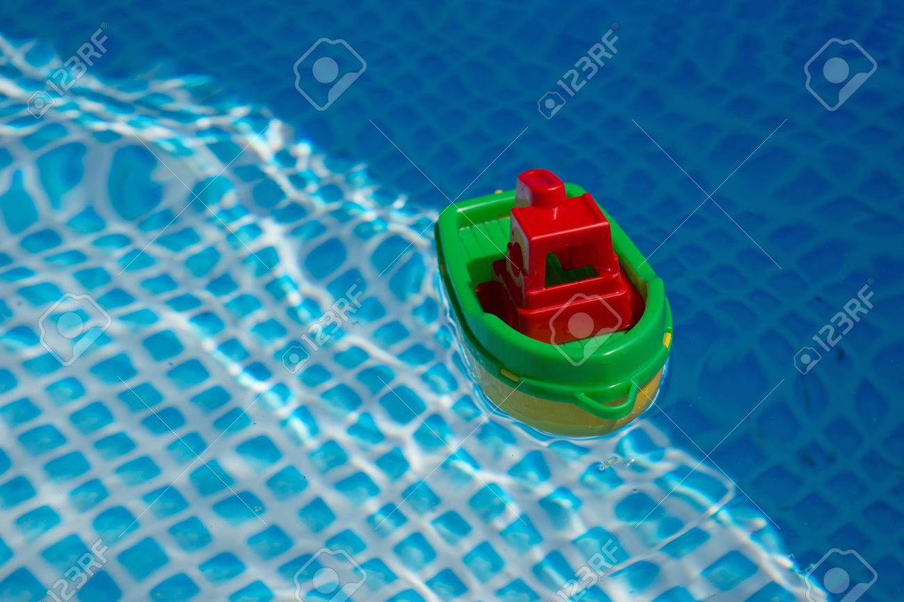 small plastic toy boats