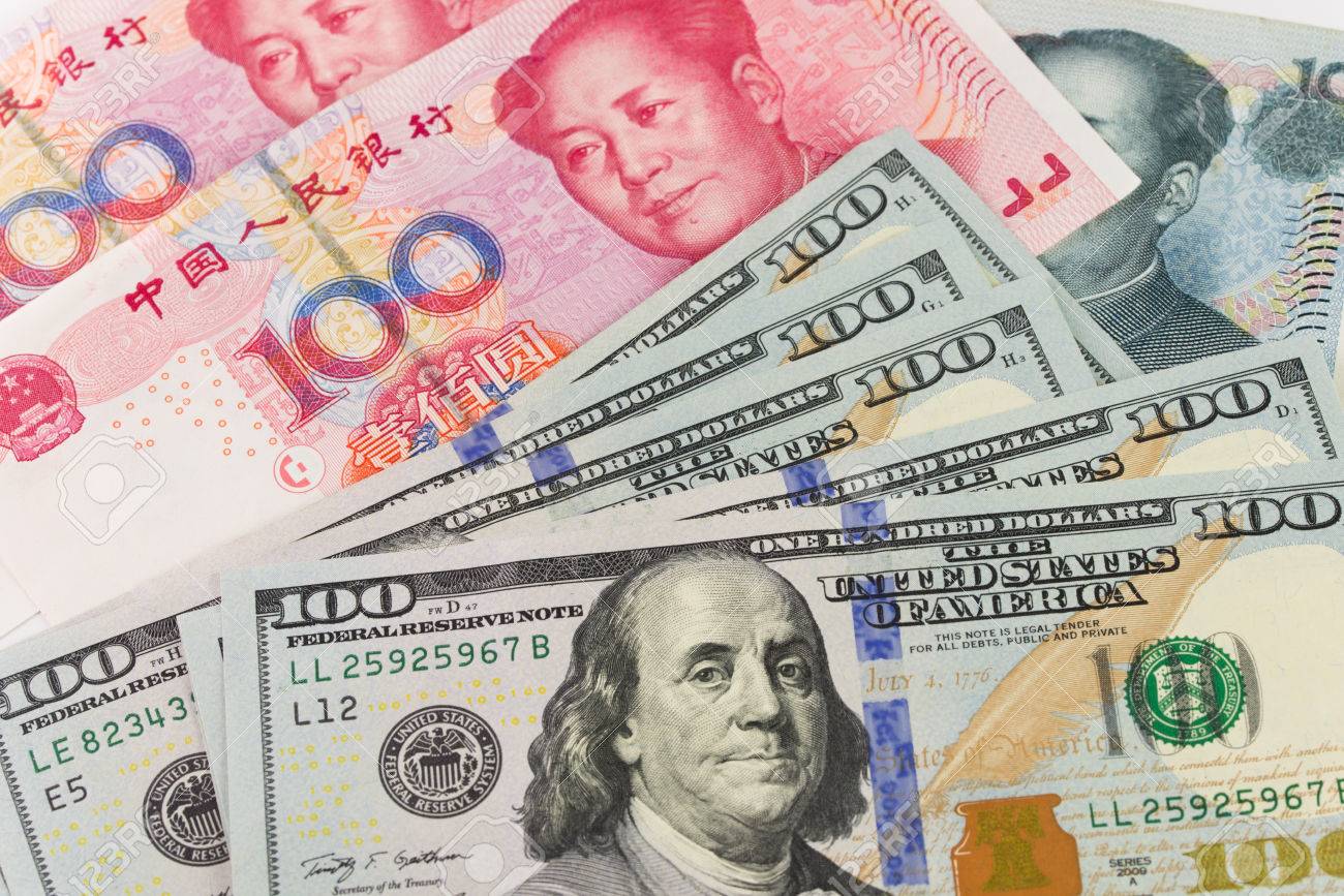 Background Of US One Hundred Dollar And China Yuan Notes Stock Photo,  Picture and Royalty Free Image. Image 25797295.