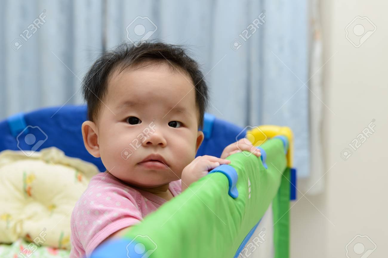 baby in playpen